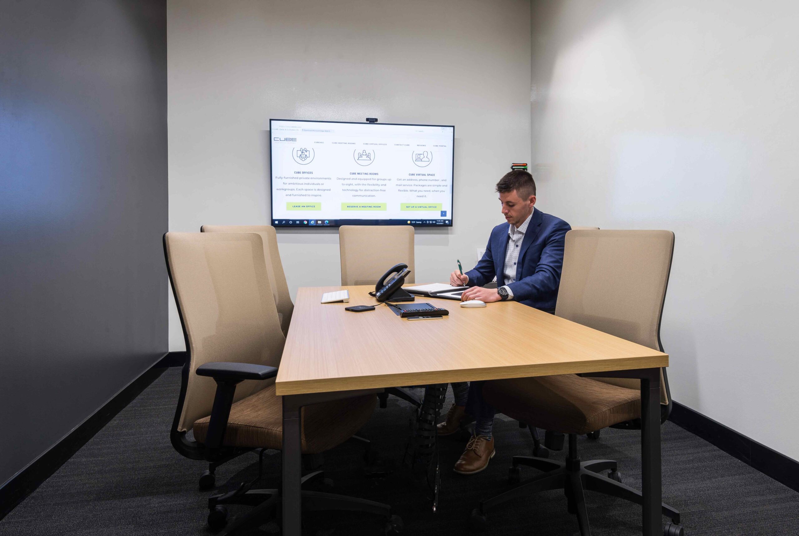 Conference room in Dallas. Meeting table seats 4 and TV is provided.