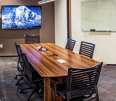 Phoenix meeting space. Conference room has TV and conference table to seat 6.