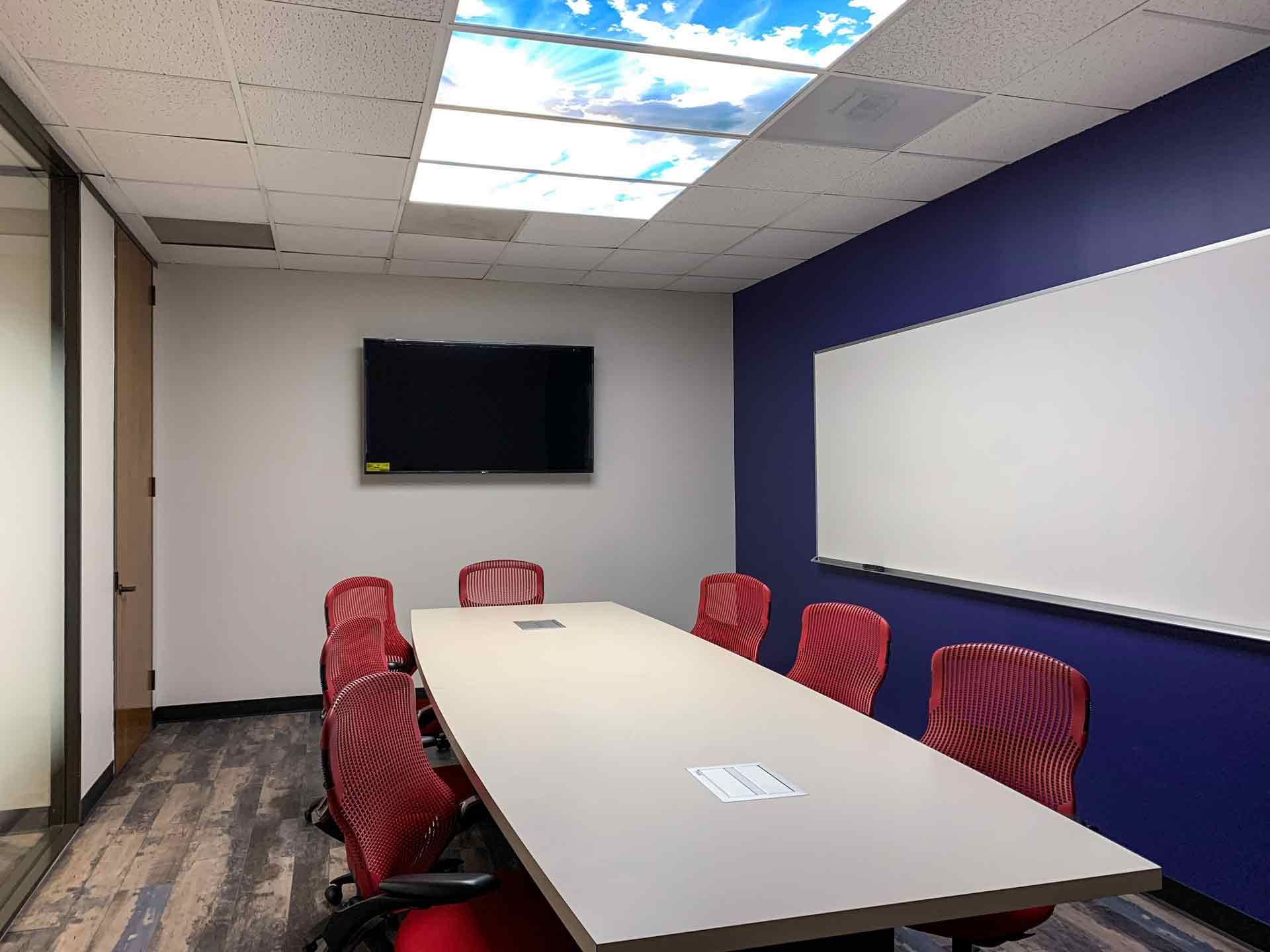 Houston meeting rooms with space for 8. Conference room has TV and whiteboard for use.