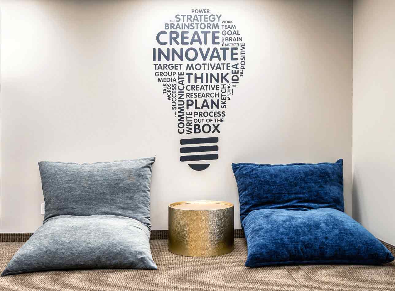 Coworking space in North Dallas. Pillows allow for comfortable shared office space.