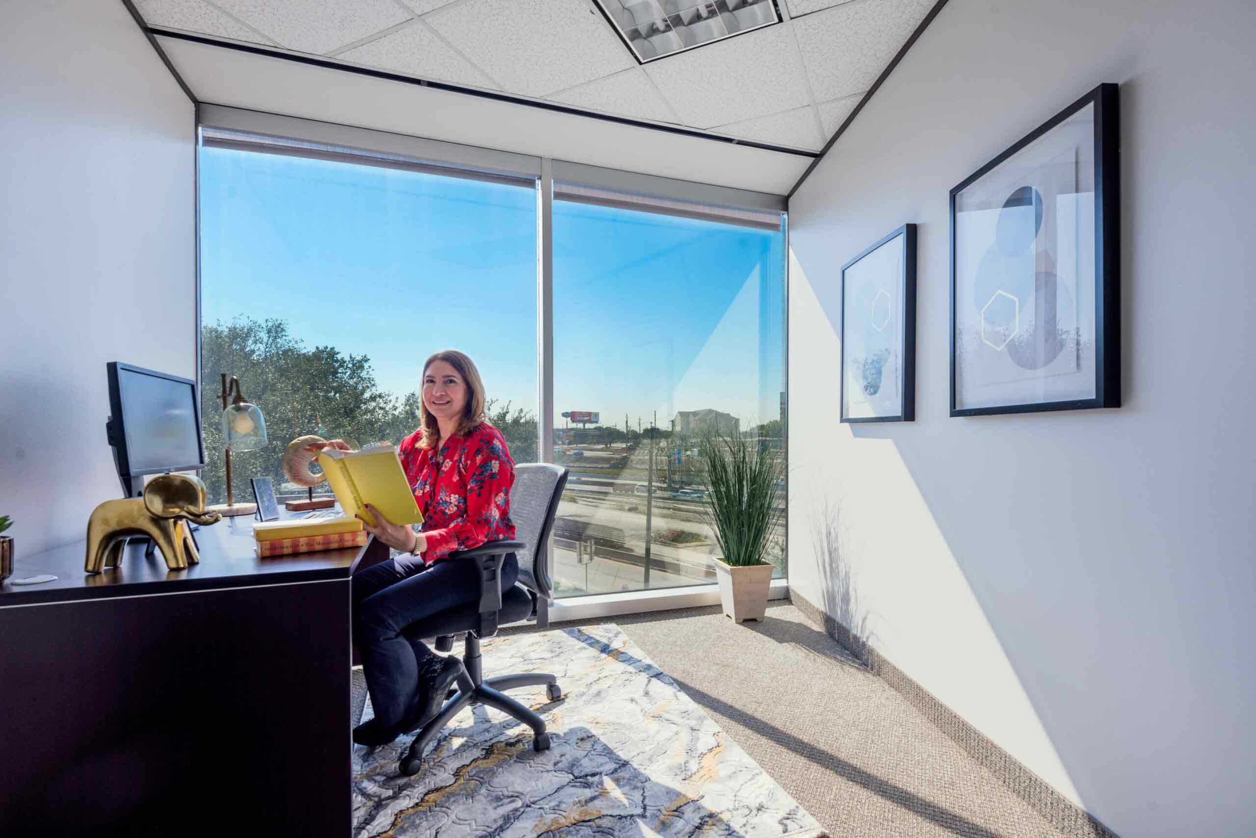 Office space for one in North Dallas with floor to ceiling windows and natural light