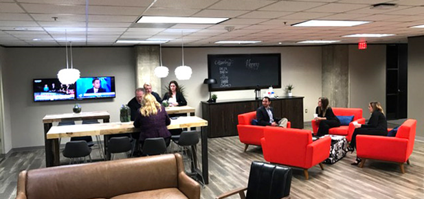 Coworking space North Dallas with 4 sofas and various shared desk spaces.